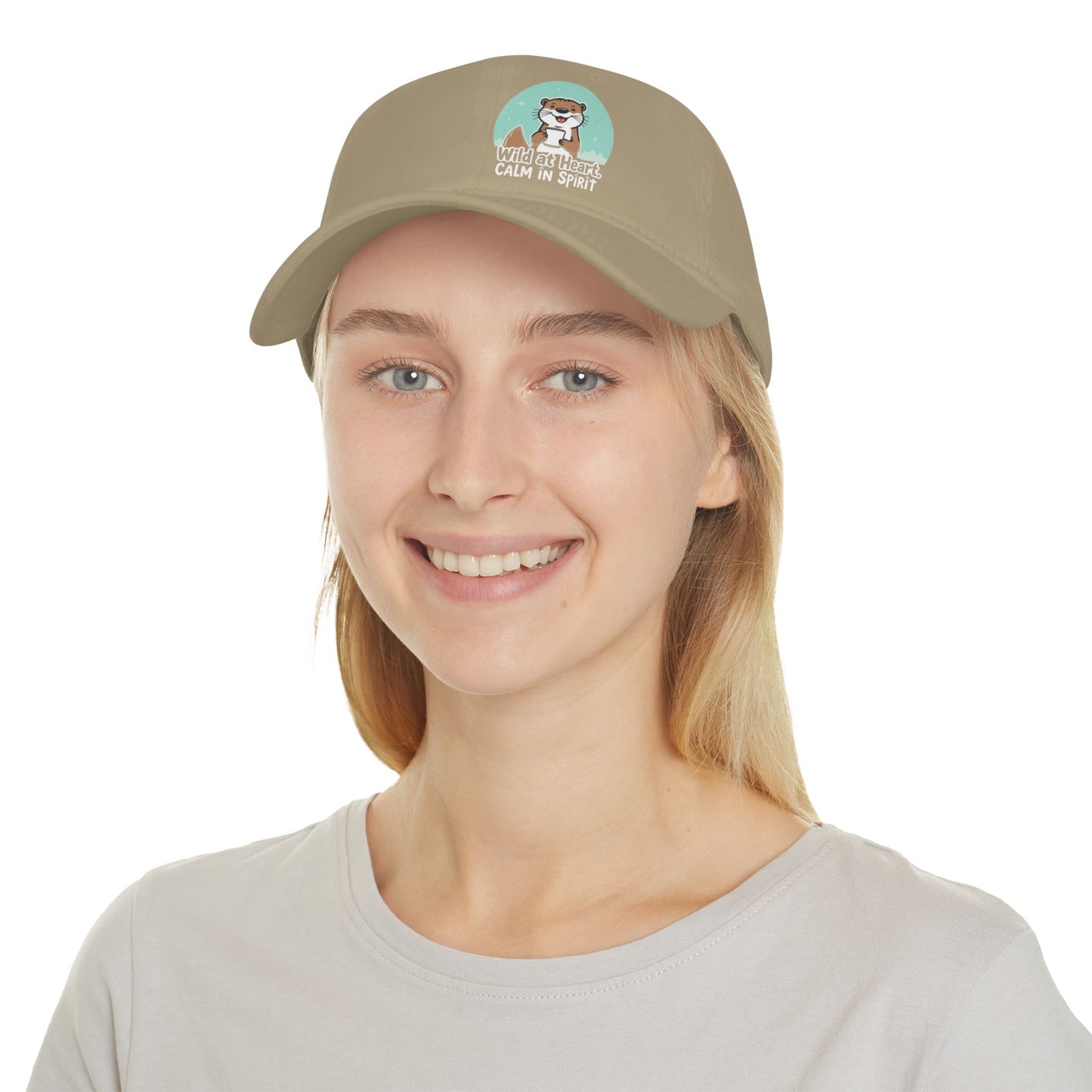 Person wearing a beige cap with a logo on a white background
