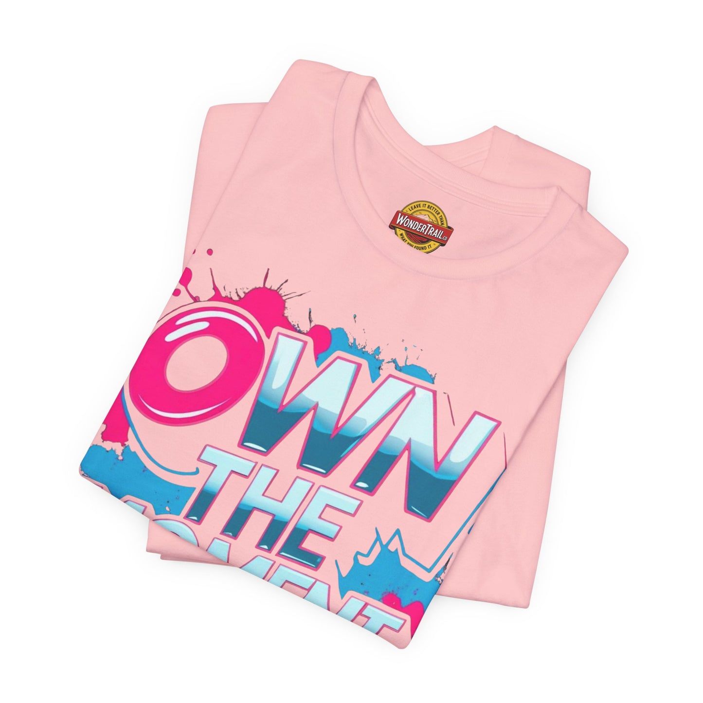 Pink t-shirt with colorful text design on a white background