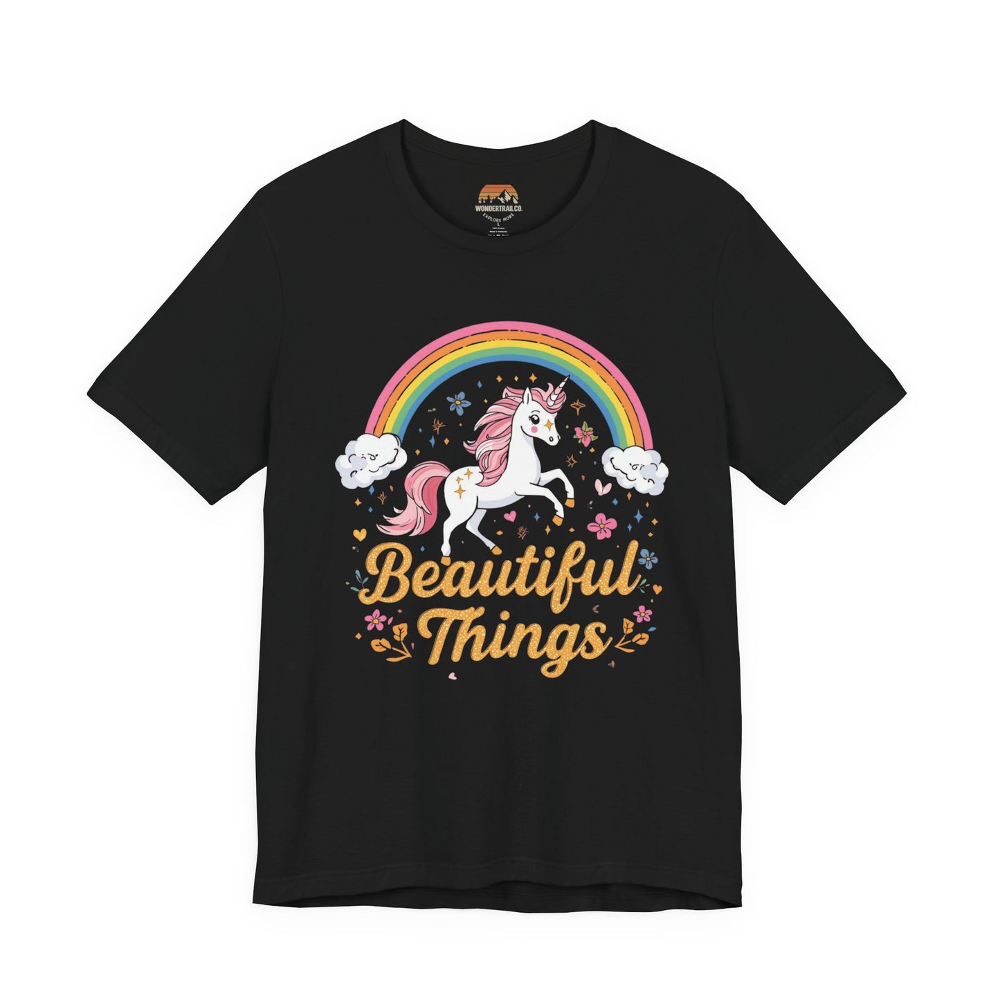 Black t-shirt with a unicorn and rainbow design on a white background