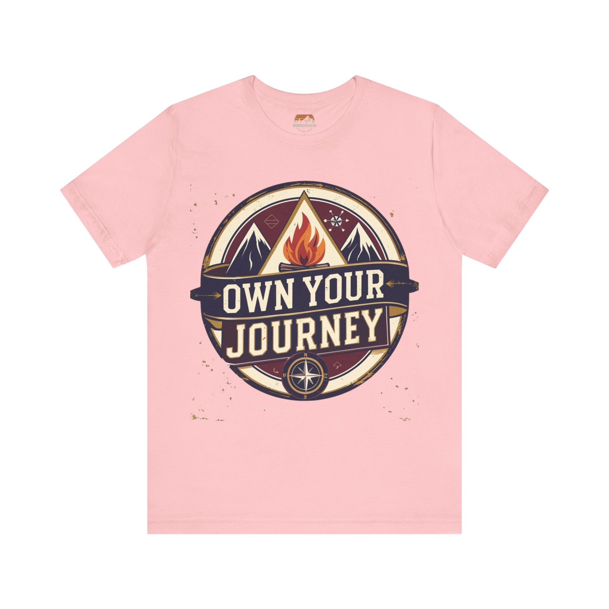 Pink t-shirt with 'Own Your Journey' graphic design on a white background