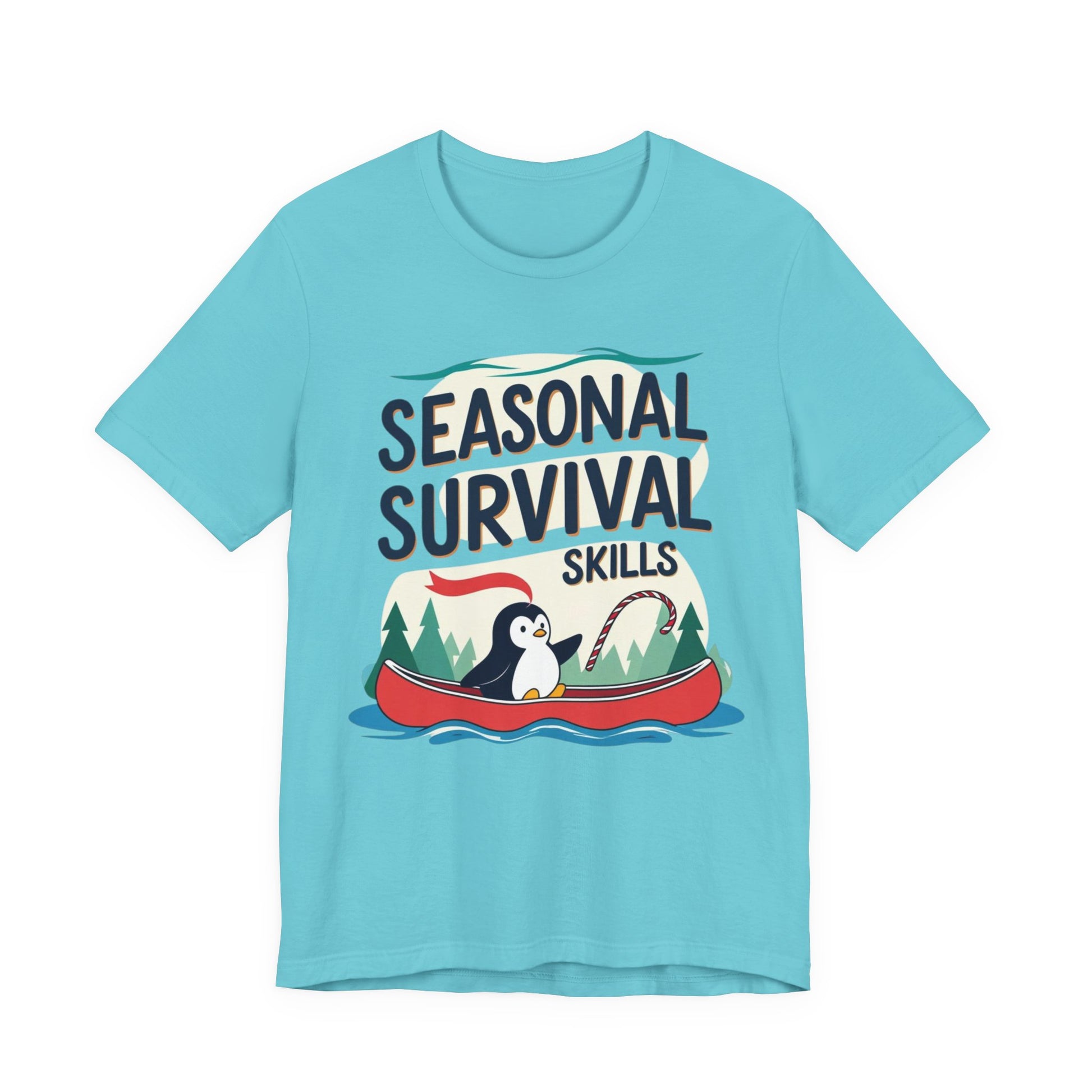 Light blue t-shirt with penguin graphic and 'Seasonal Survival Skills' text on a white background