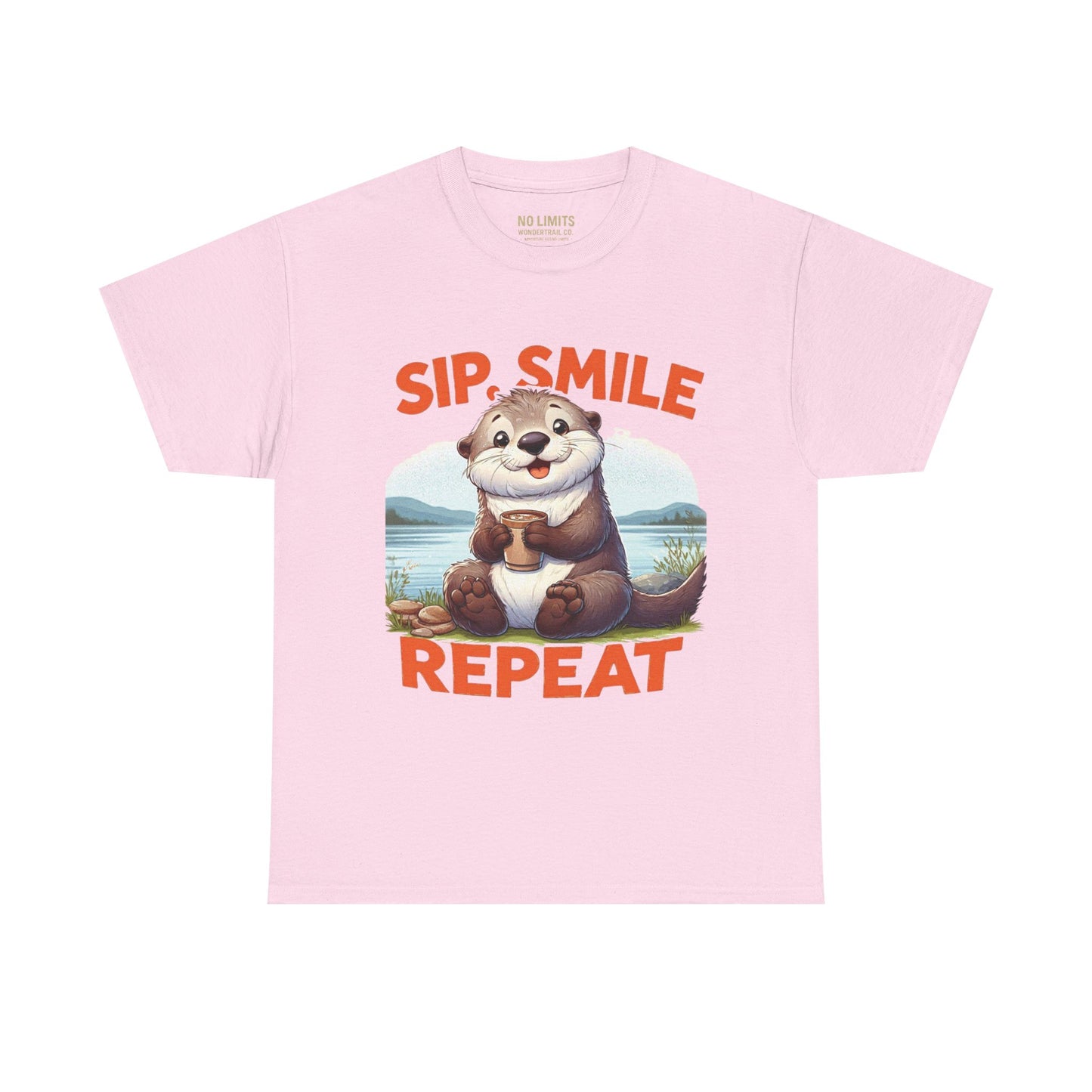 Pink t-shirt with an otter graphic and text 'Sip Smile Repeat' on a white background