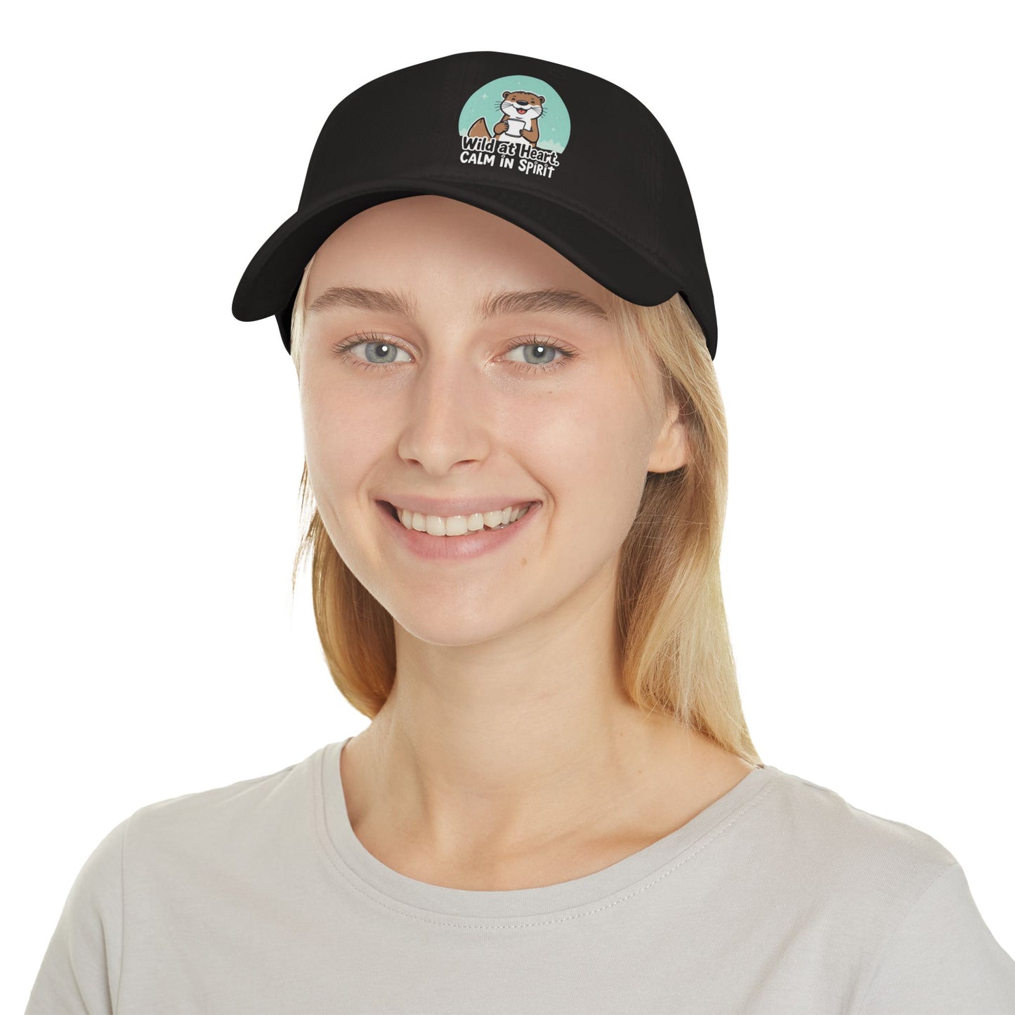 Person wearing a black cap with a logo on a white background