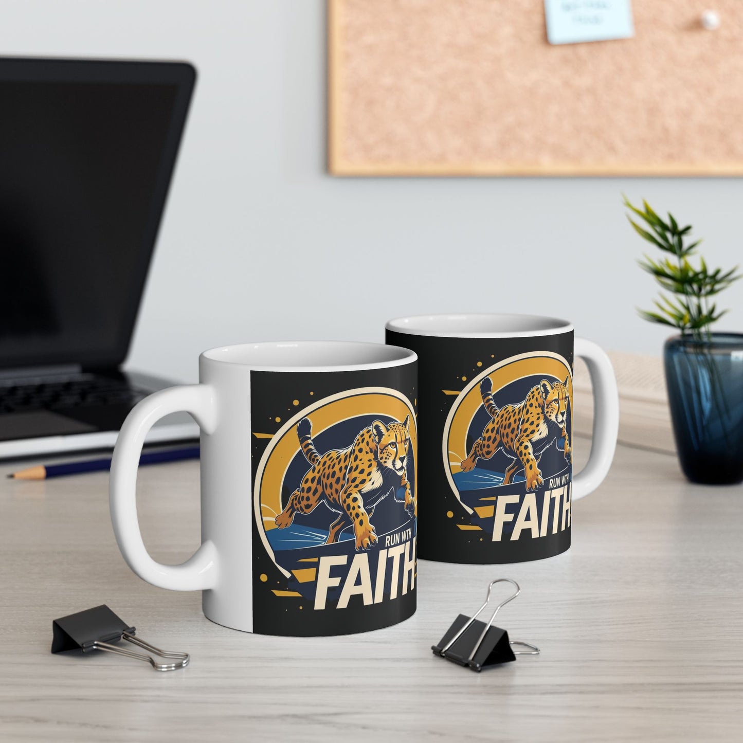 Two mugs with a leopard design and 'Faith' text on a desk with office items.
