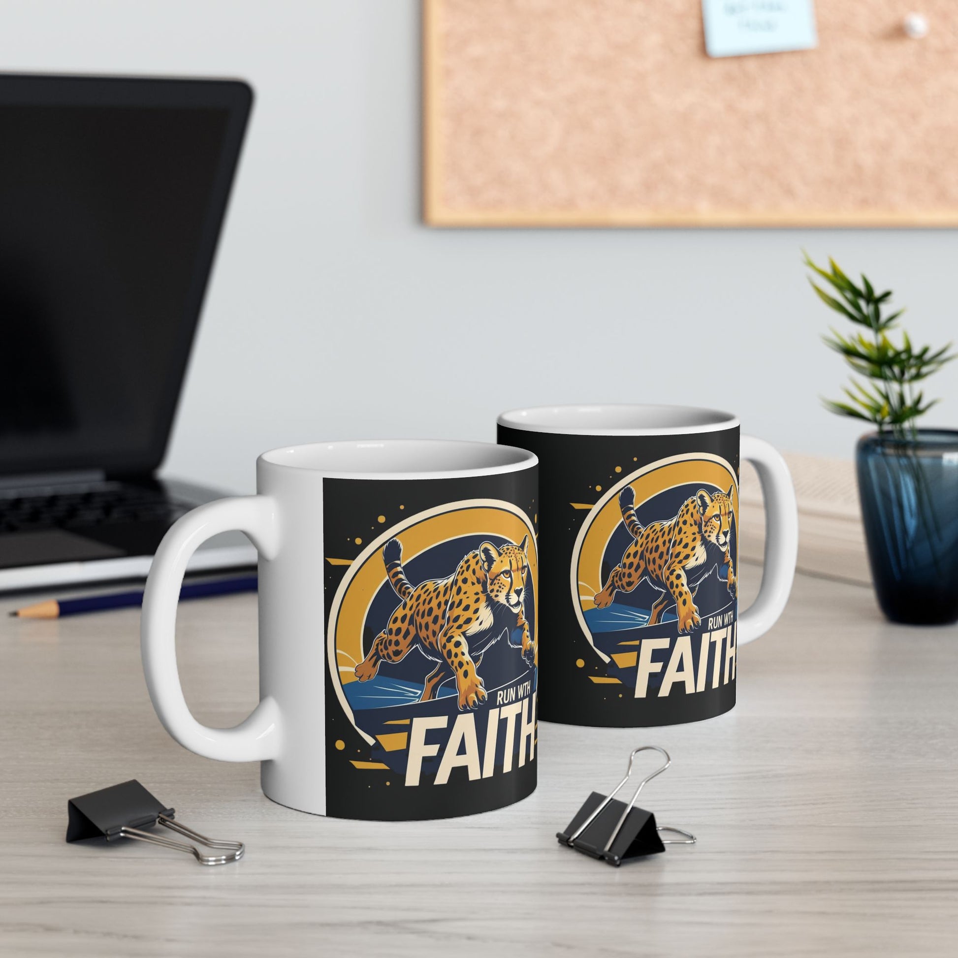 Two mugs with a leopard design and 'Faith' text on a desk with office items.