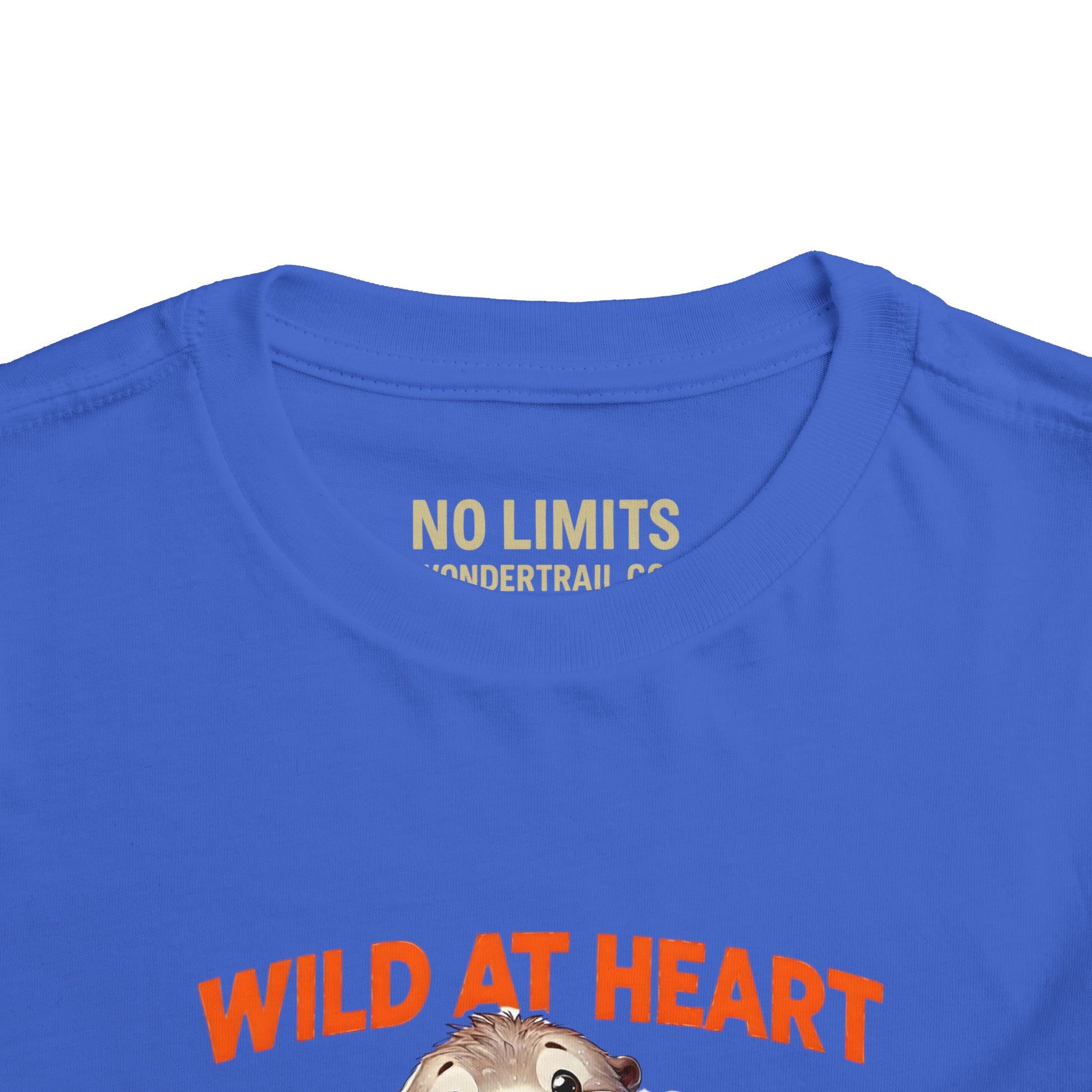 Blue t-shirt with 'No Limits' and 'Wild at Heart' text and a graphic of a bear.