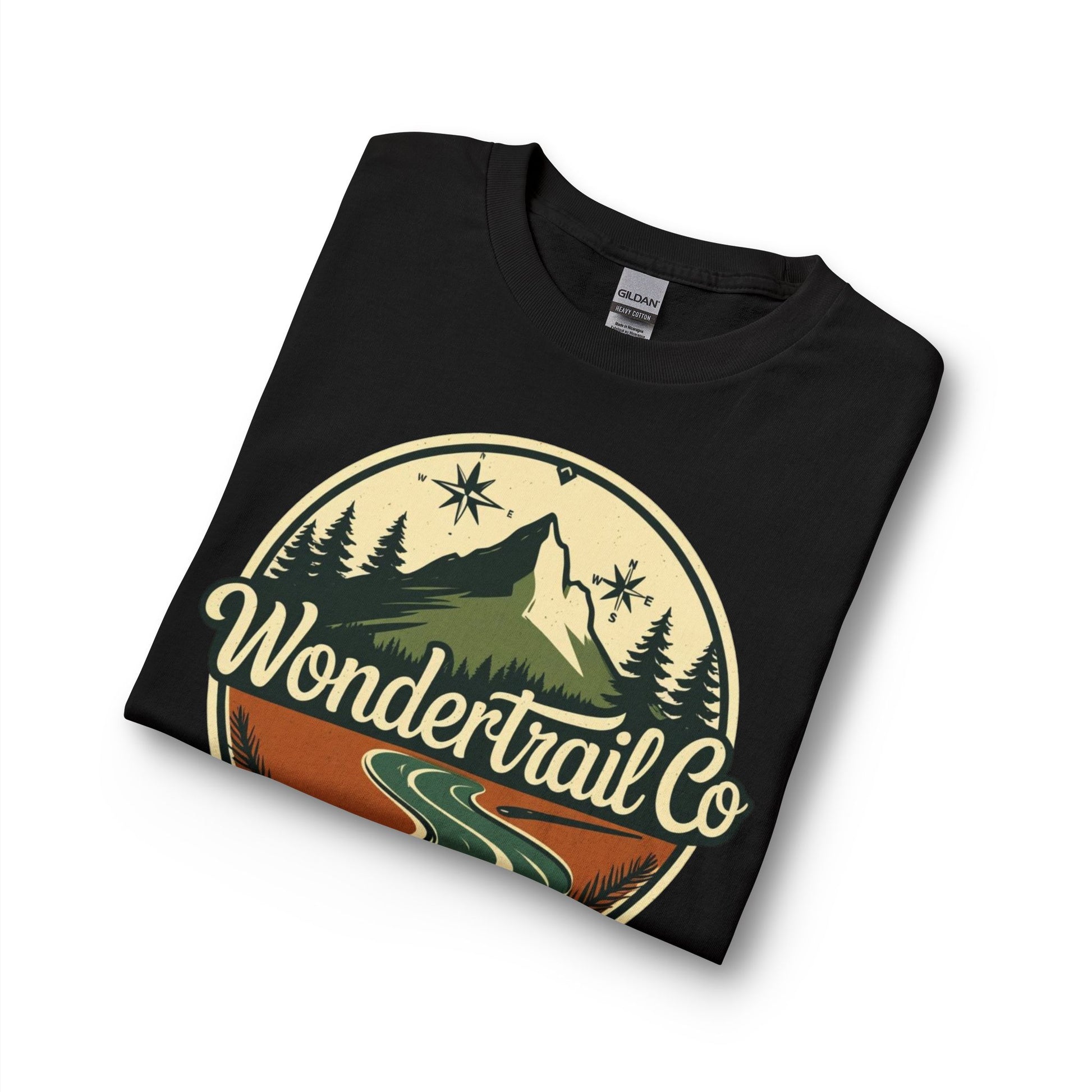 Folded black t-shirt with 'WonderTrail Co' logo featuring a mountain and trees on a white background