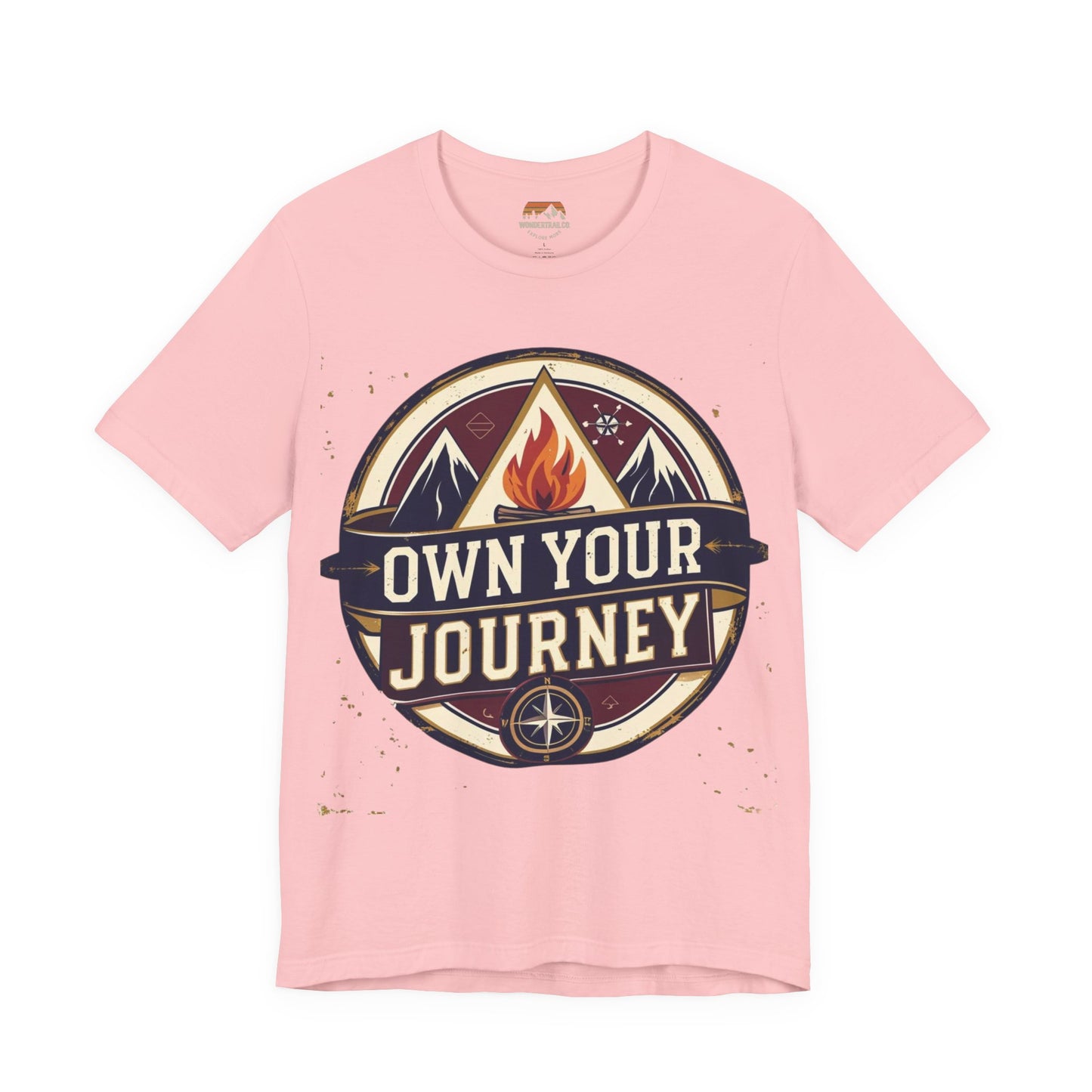 Pink t-shirt with 'Own Your Journey' graphic design on a white background
