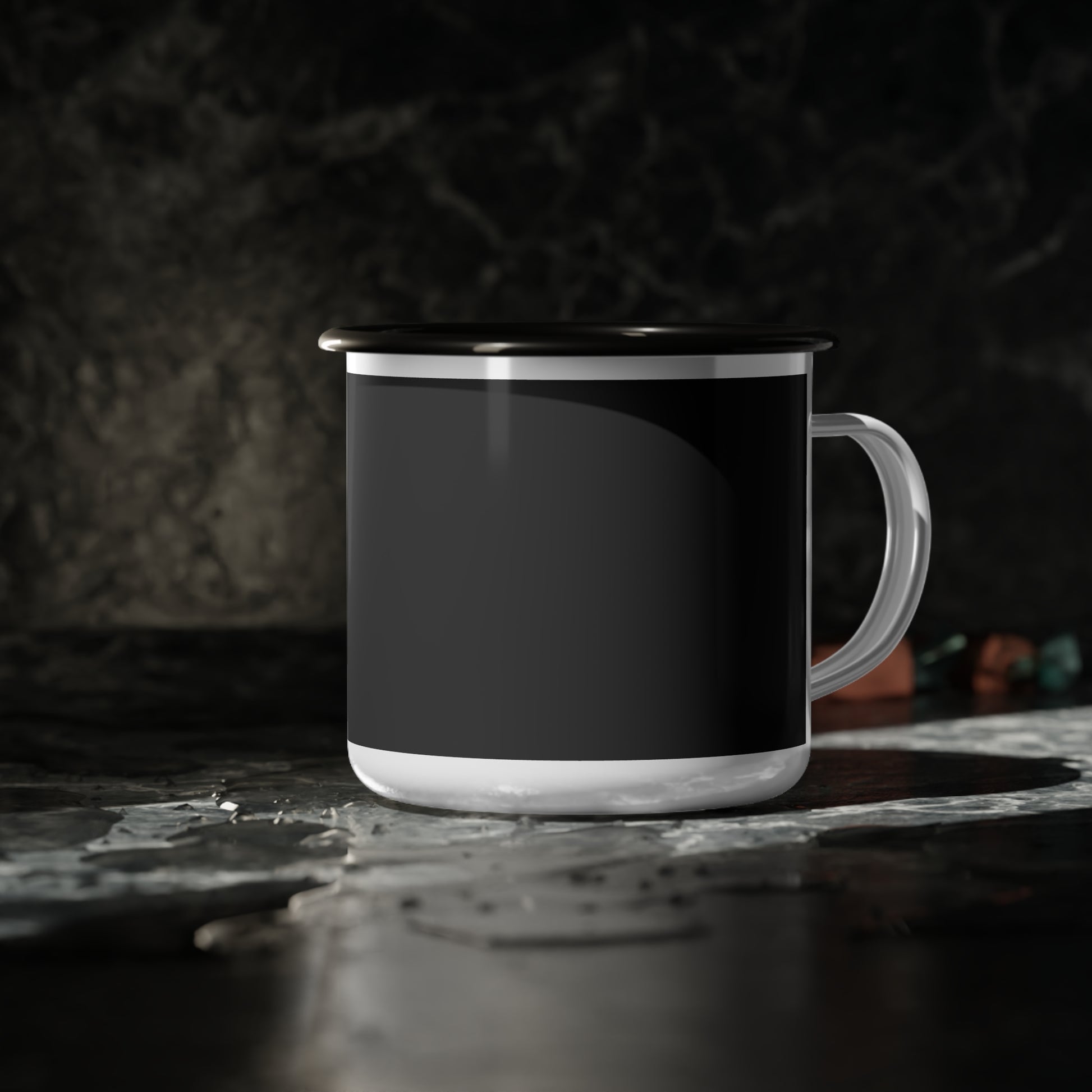 Black mug with white interior on a dark surface