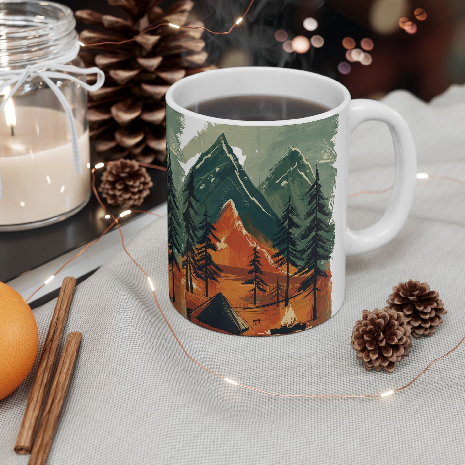 Front Ceramic_outdoor_mug_with_mountain_and_forest_design_tent_and_campfire_artwork_styled_in_winter_holiday_scene_eco-friendly_rustic_gift_for_campers_and_nature_lovers