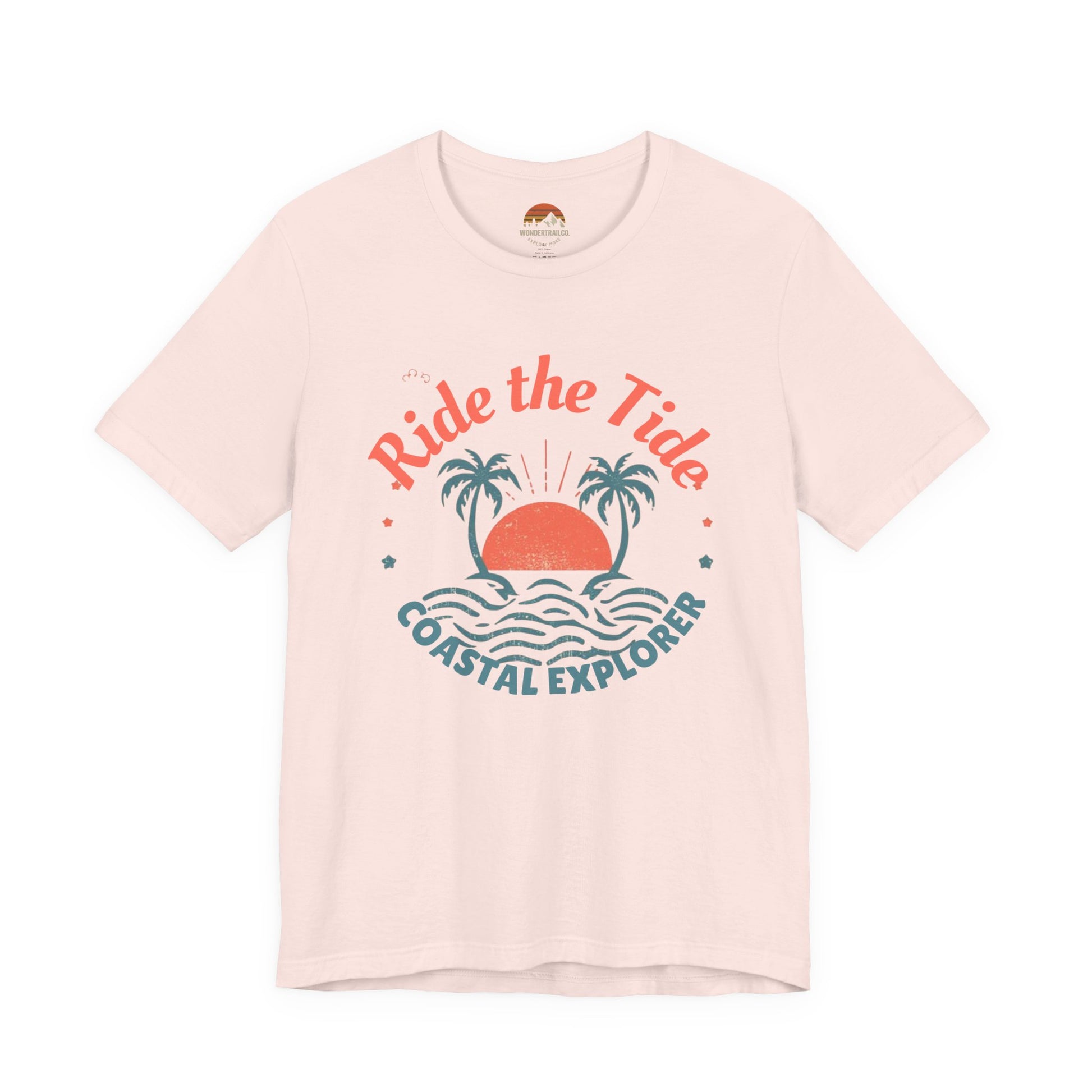 Front shirt _Pink_Black_cotton_unisex_tee_featuring_tropical_sunset_and_palm_tree_design_with_Ride_the_Tide_Coastal_Explorer_text_stylish_travel_apparel_for_adventurers.