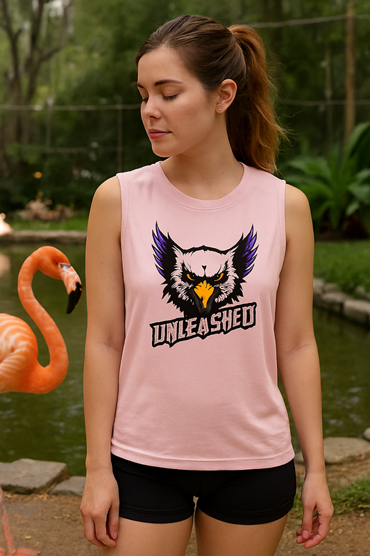 Light pink sleeveless shirt with bold eagle head graphic and Unleashed slogan, outdoor adventure apparel for explorers, wildlife lovers, and motivational fashion.
