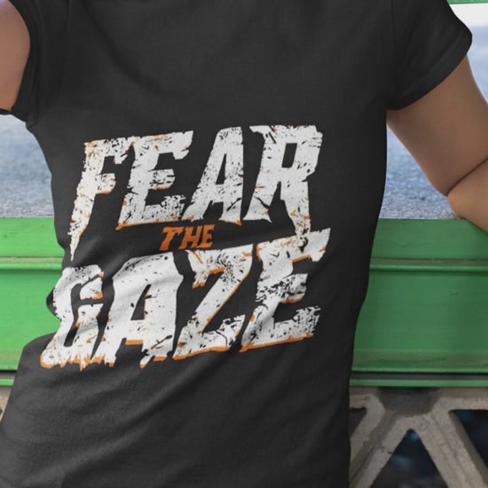 Firefly Create a cinematic short video featuring two models wearing black t-shirts with bold tiger-e